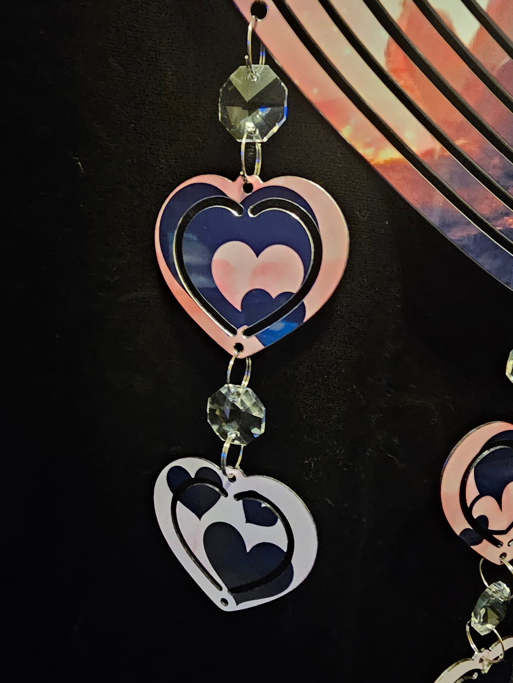 Heart Shaped Wind Spinner with a Loving Couple in the Sunset