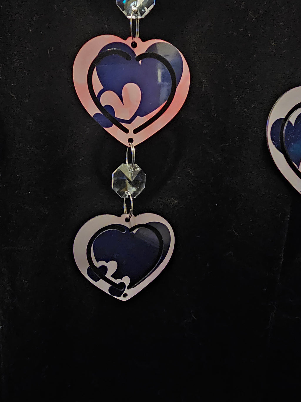 Heart Shaped Wind Spinner with a Loving Couple in the Sunset