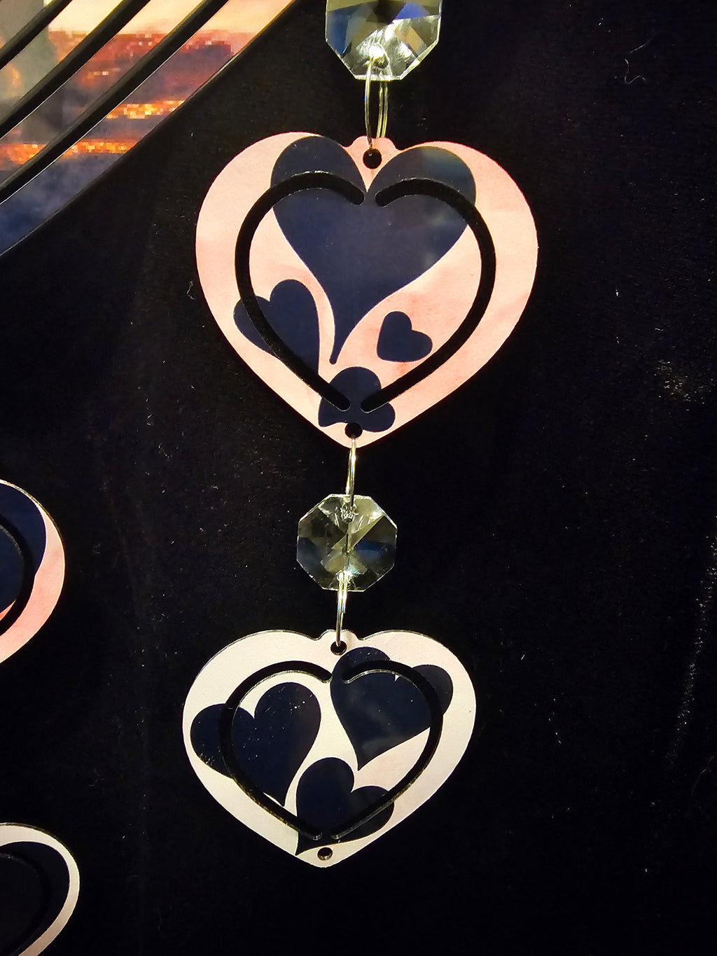 Heart Shaped Wind Spinner with a Loving Couple in the Sunset