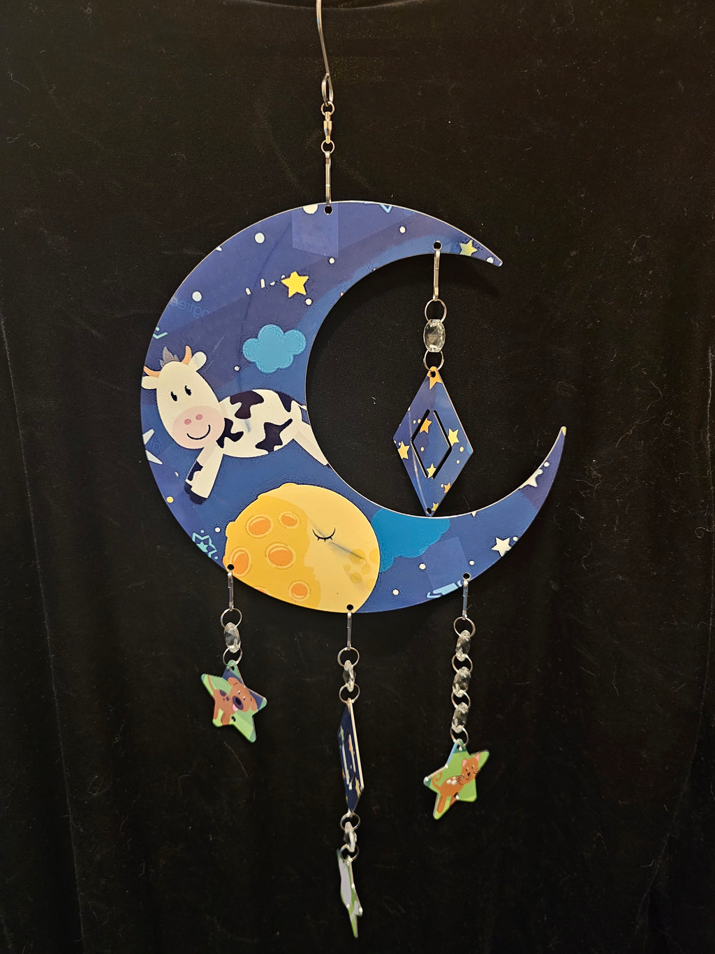 Moon Shaped Wind Spinner with a Cow Jumping Over the Moon
