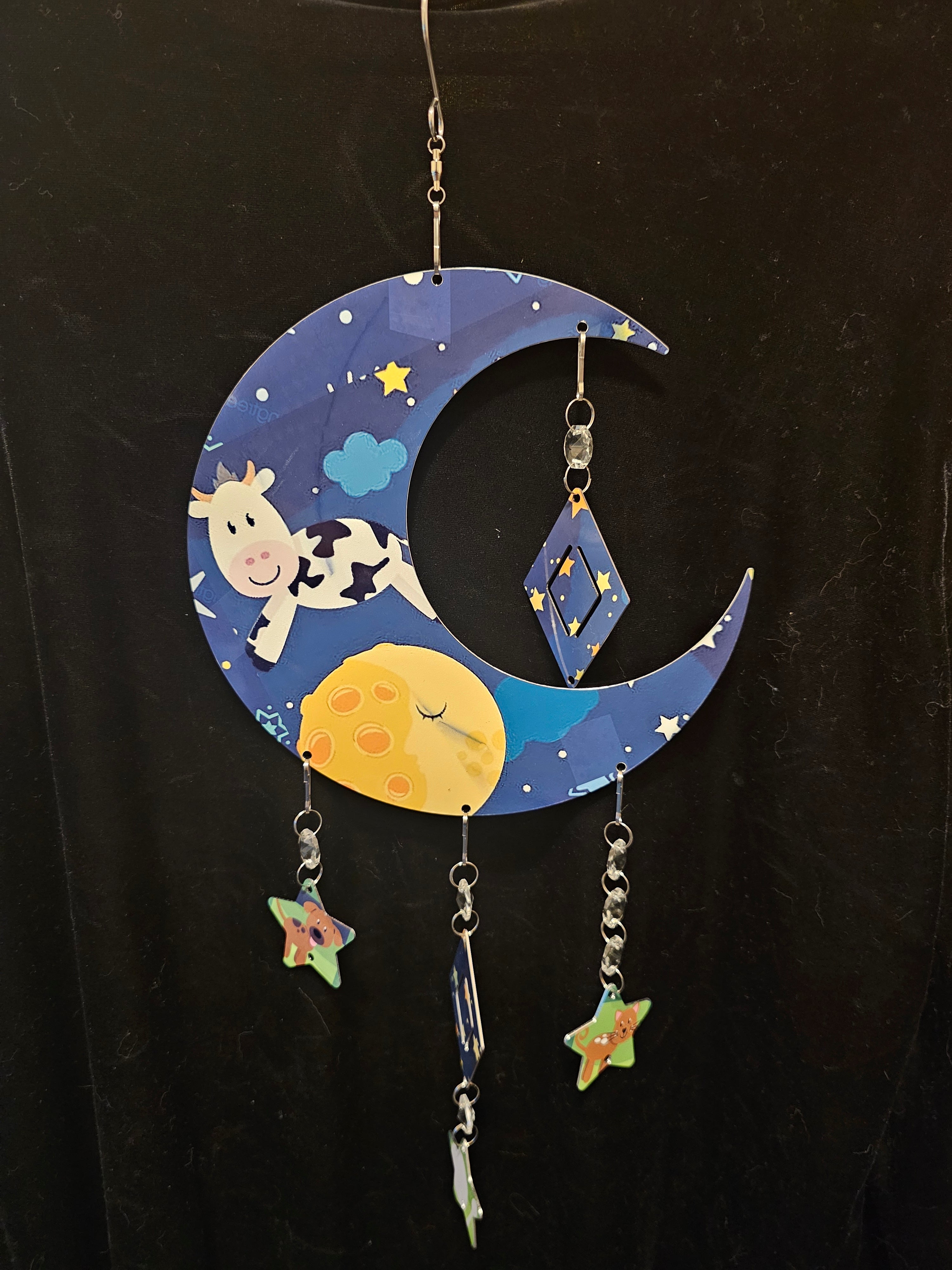 Moon Shaped Wind Spinner with a Cow Jumping Over the Moon
