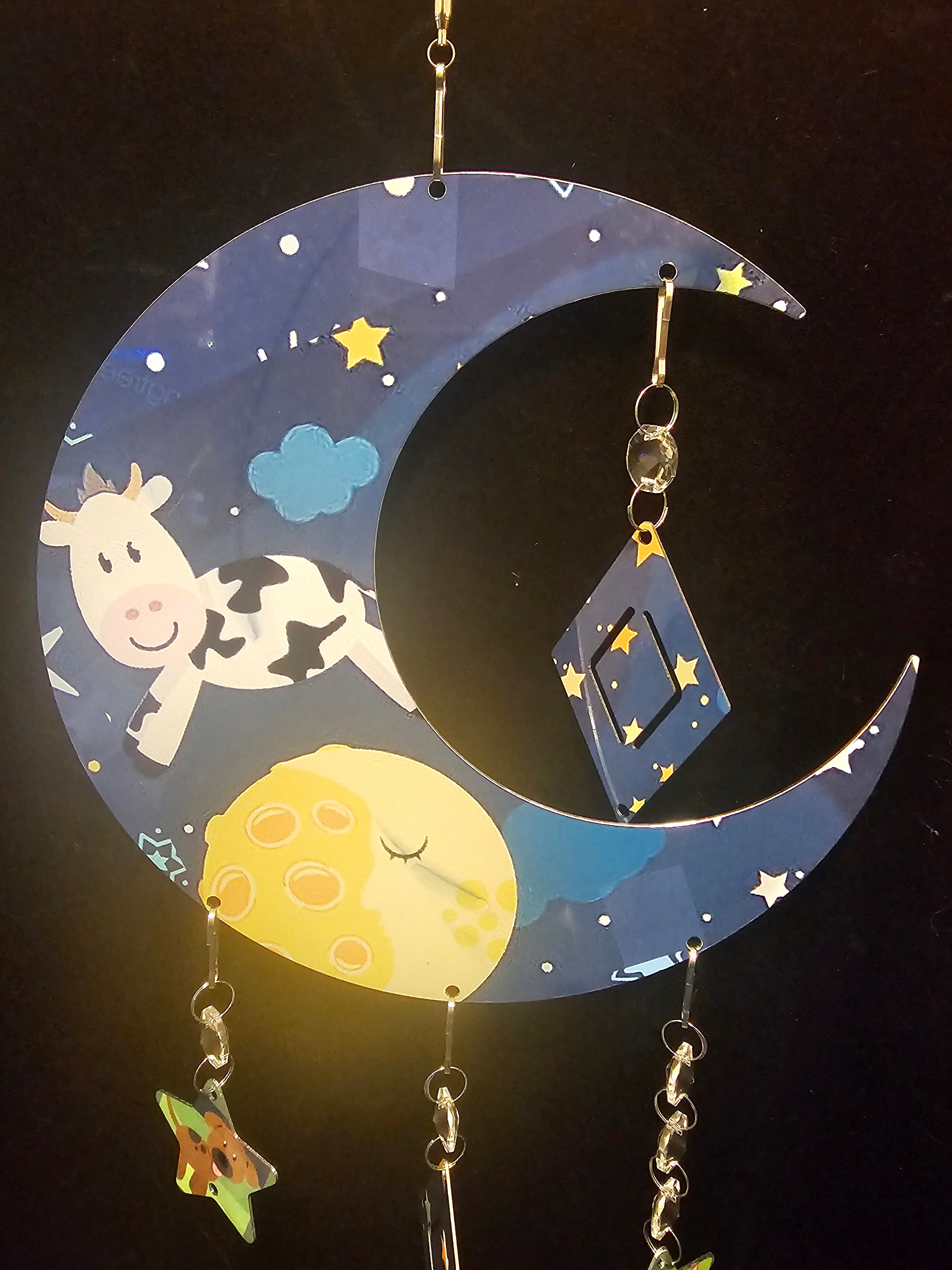 Moon Shaped Wind Spinner with a Cow Jumping Over the Moon