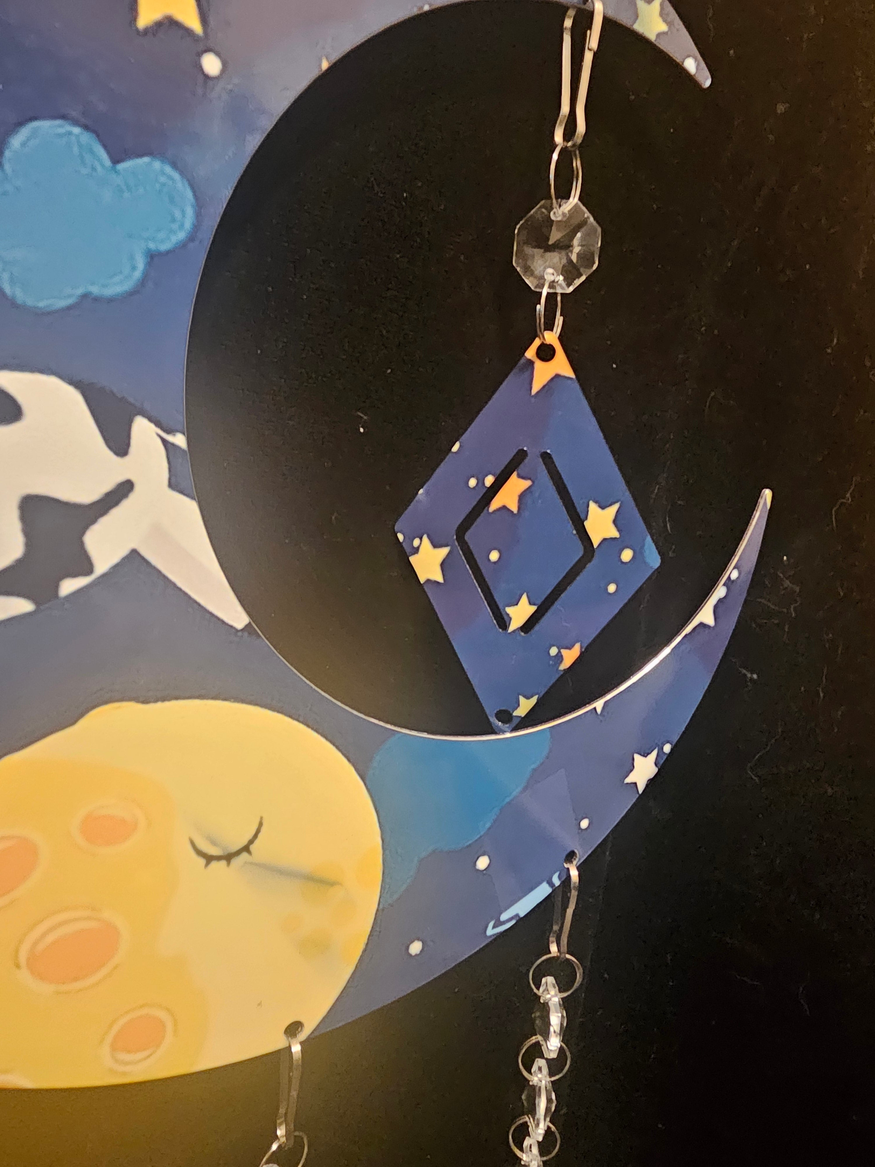 Moon Shaped Wind Spinner with a Cow Jumping Over the Moon