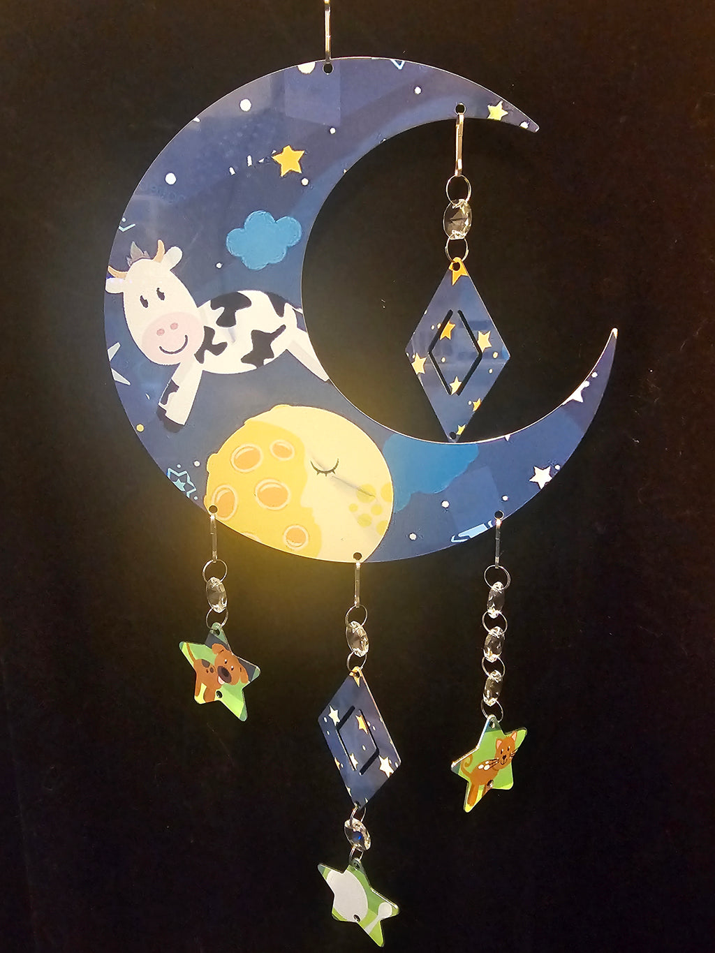 Moon Shaped Wind Spinner with a Cow Jumping Over the Moon
