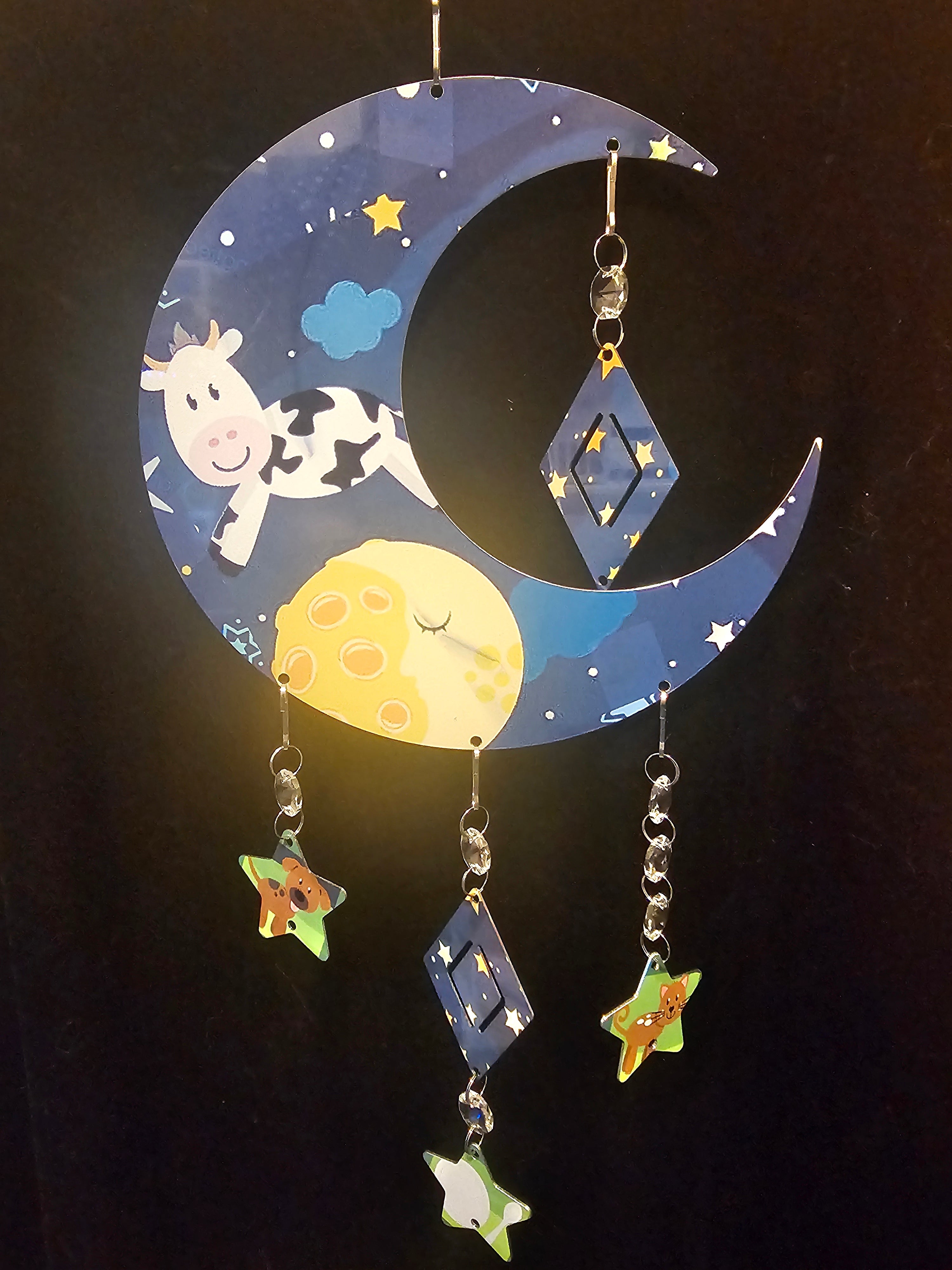 Moon Shaped Wind Spinner with a Cow Jumping Over the Moon