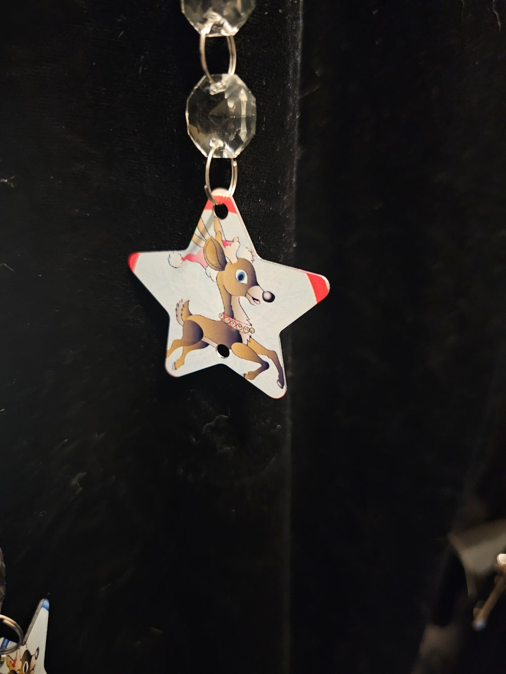 Moon Shaped Wind Spinner with the Reindeer Pulling Santa's Sleigh