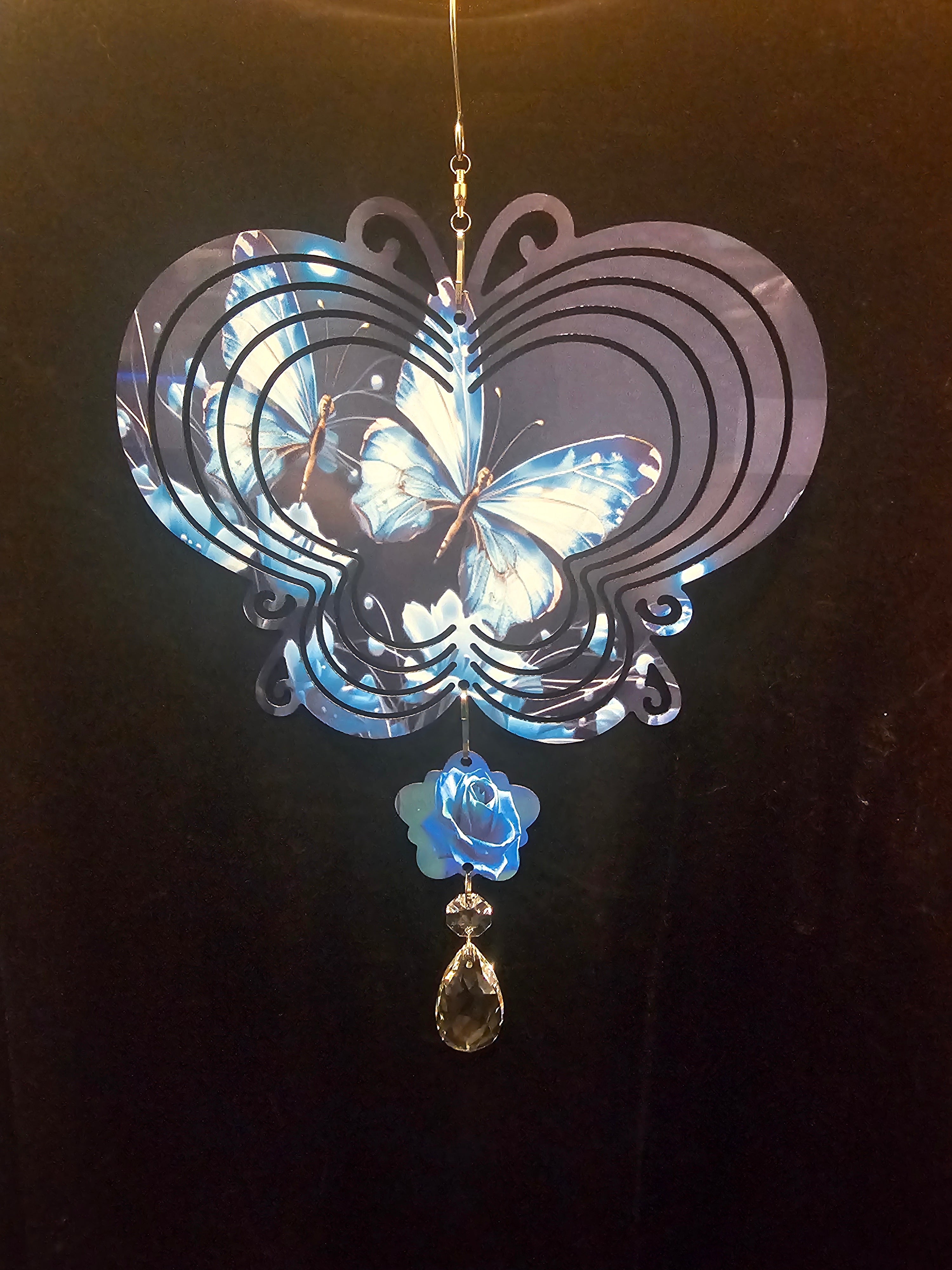 Butterfly Shaped Wind Spinner with a Blue Butterfly