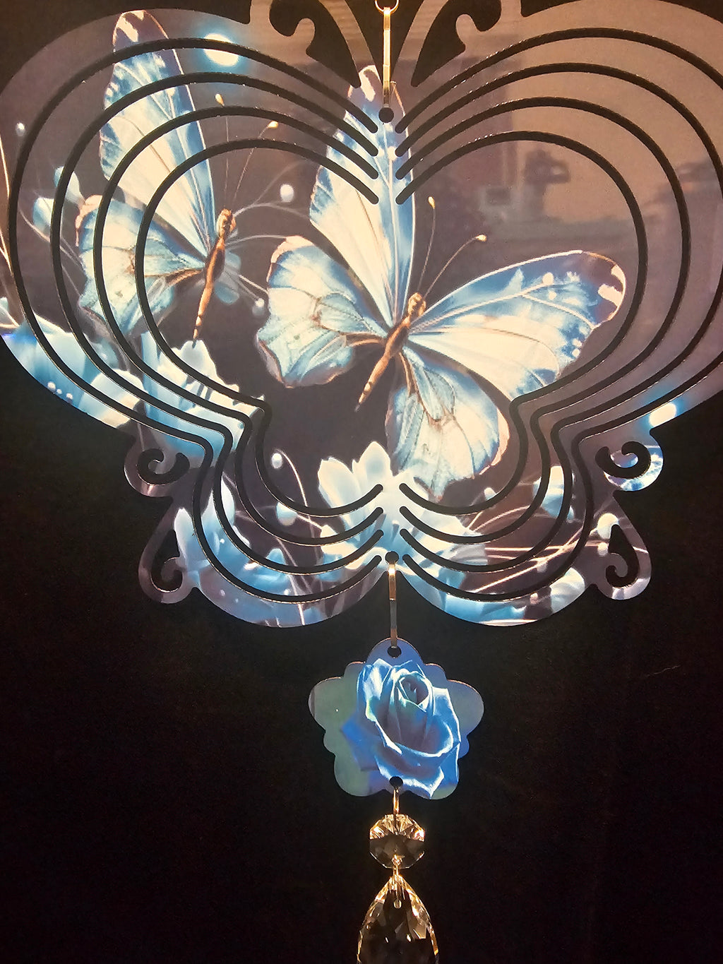 Butterfly Shaped Wind Spinner with a Blue Butterfly