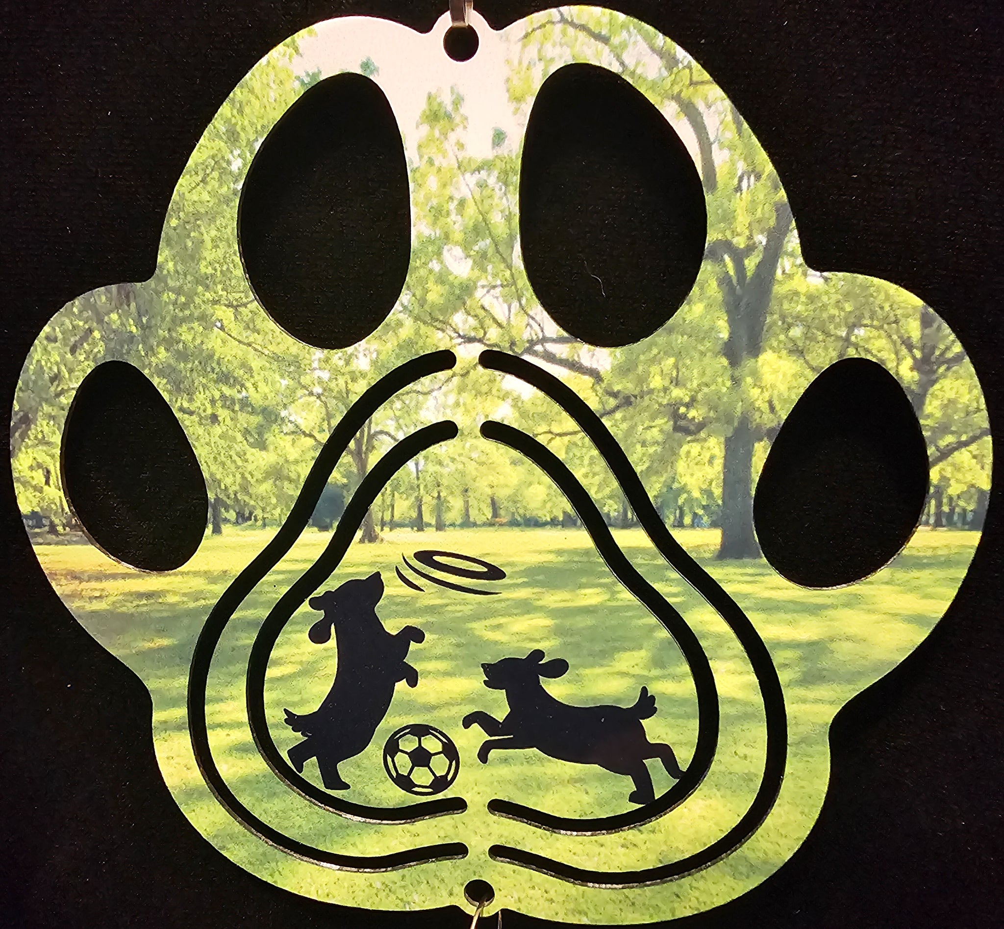 Paw Print Dogs Playing in the Park Wind Spinner