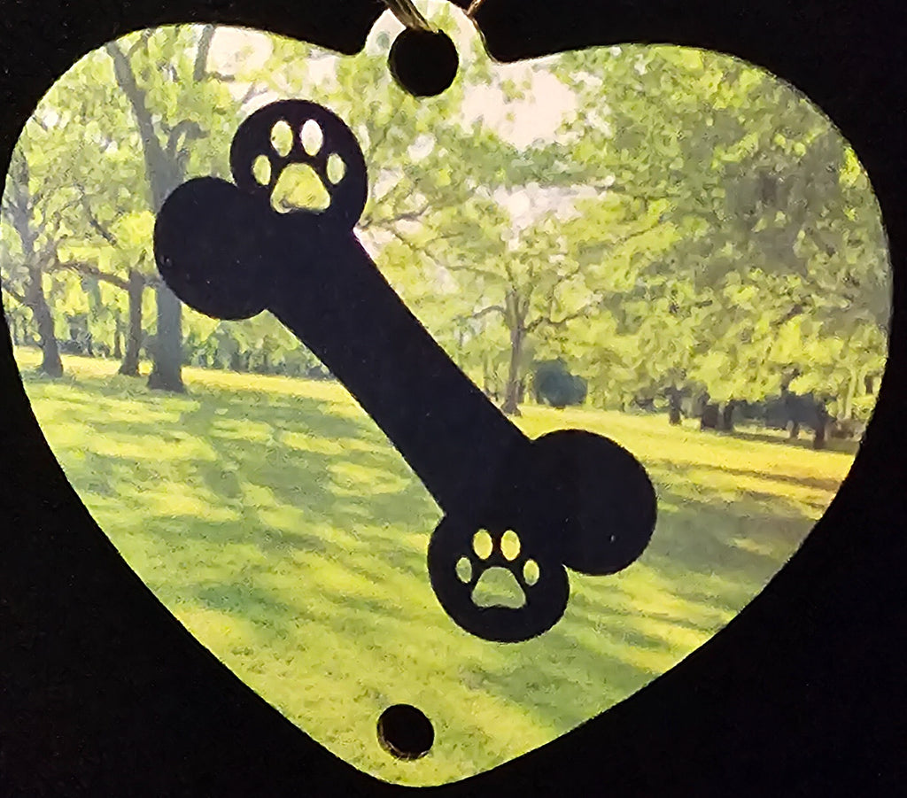 Paw Print Dogs Playing in the Park Wind Spinner