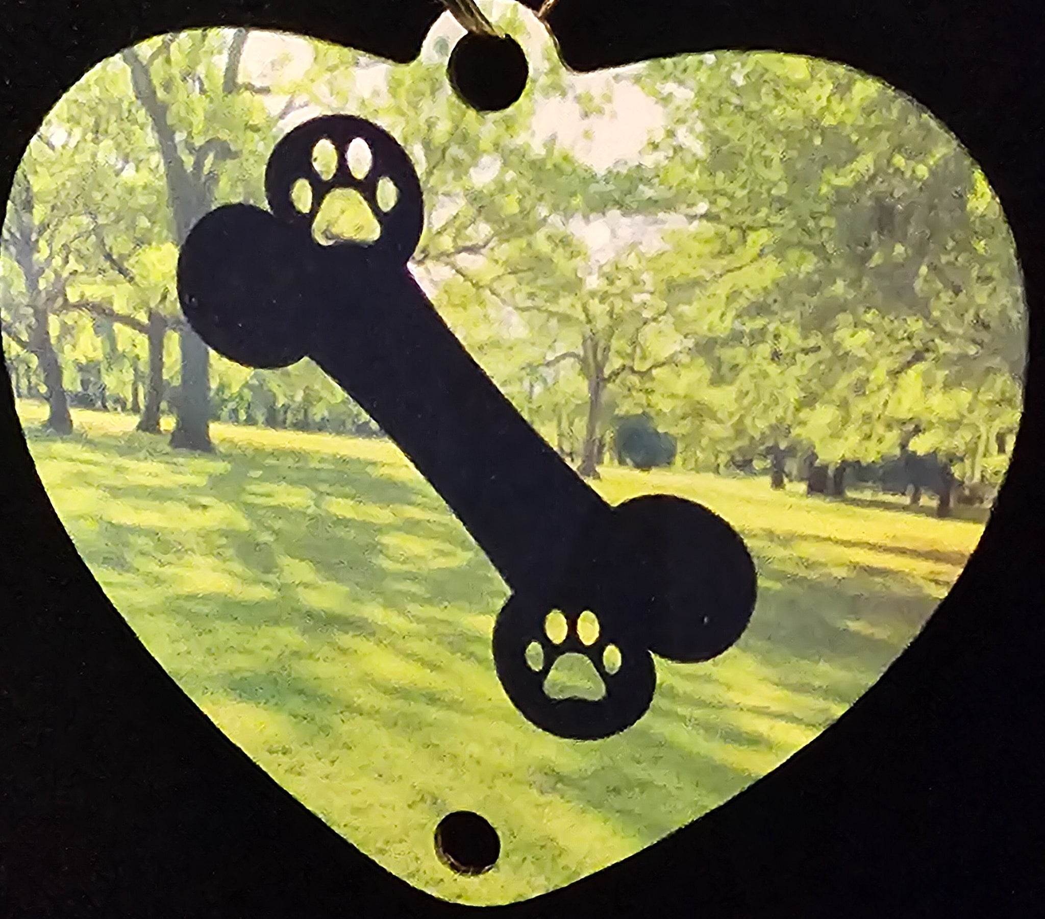 Paw Print Dogs Playing in the Park Wind Spinner